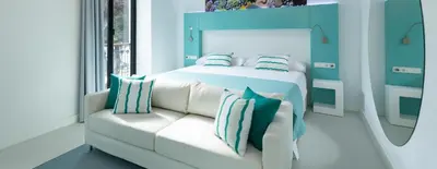 Cama o camas de una habitación en HD Acuario Lifestyle