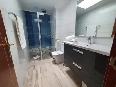 Un baño de APARTAMENTO SUNSET PUERTO DE MOGAN