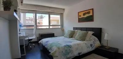 Cama o camas de una habitación en Apartamento La Marina-Ciudad Jardin