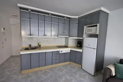 Una cocina o zona de cocina en Bonito apartamento 115 by CASAS COCODRILO