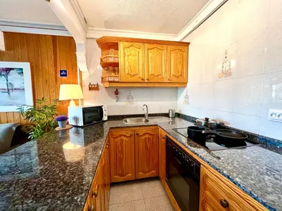 Una cocina o zona de cocina en Cozy Apartment Near Yumbo