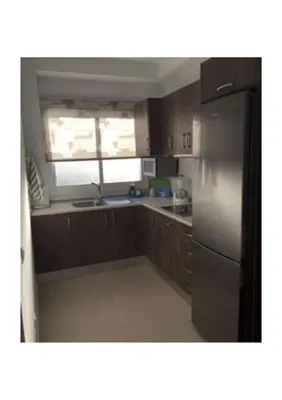 Una cocina o zona de cocina en Apartamentos cerca del Aeropuerto