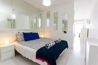 Cama o camas de una habitación en Blue Vista Apartment