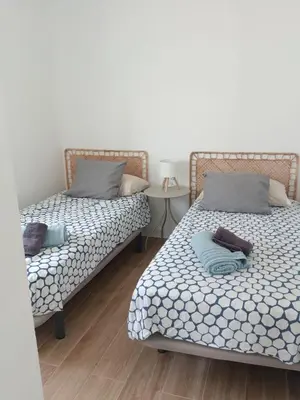 Cama o camas de una habitación en Confortable y luminoso bungalow en Maspalomas
