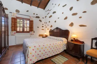 Cama o camas de una habitación en Casa Rural Tinamar