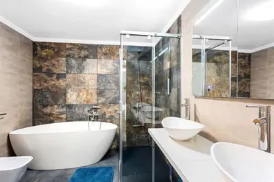 Un baño de Luxury Penthouse Puerto de Mogan with great terrace and sea view