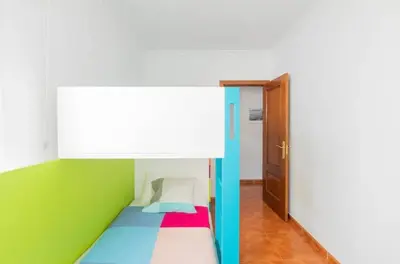 Cama o camas de una habitación en El Balcón De Arinaga