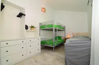 Cama o camas de una habitación en The Safe Point Residential Castillo