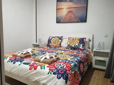 Cama o camas de una habitación en BRISAS DEL MAR APARTMENT, ONE STEP FROM THE SEA.