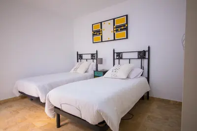 Cama o camas de una habitación en Calle Lanzarote 29C
