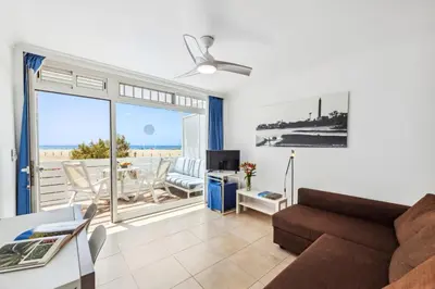 Zona de estar de Apartamentos El Capricho