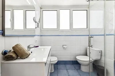 Un baño de Apartamentos El Capricho