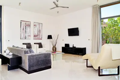 Una televisión o centro de entretenimiento en Villas Opal Anfi Tauro
