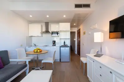 Una cocina o zona de cocina en TC Apartamentos Don Diego