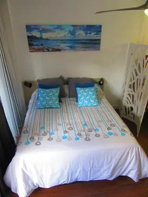 Cama o camas de una habitación en Estudio con encanto en la playa (aptos.salinetas)