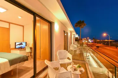 Un balcón o terraza de BeachFront Suites Morea Puerto Rico by VillaGranCanaria