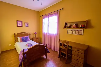 Cama o camas de una habitación en Casa Mami Yaya