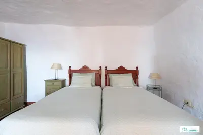 Cama o camas de una habitación en Living Artenara - CAVE HOUSE & SILENCE Adults Only
