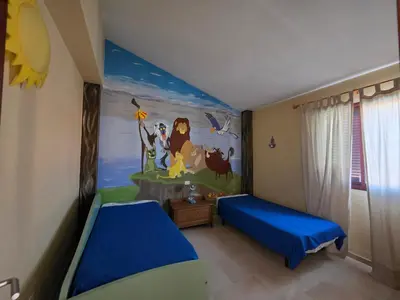 Cama o camas de una habitación en La Casa Sahi