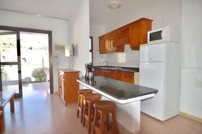 Una cocina o zona de cocina en Comfortable Apartment in Puerto Rico