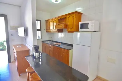 Una cocina o zona de cocina en Comfortable Apartment in Puerto Rico