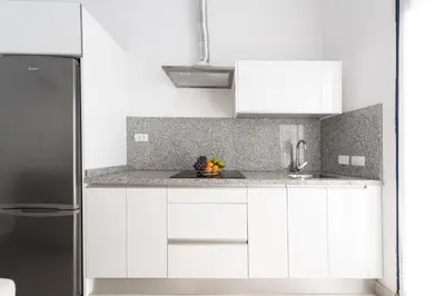 Una cocina o zona de cocina en La Rama puerto de las Nieves Vivienda Vacacional