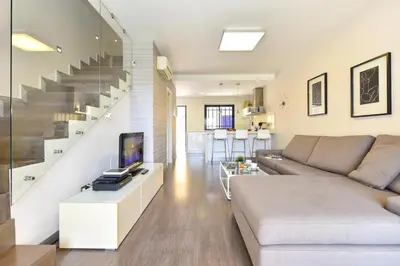 Una televisión o centro de entretenimiento en Casas Meloneras by VillaGranCanaria