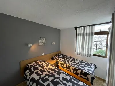 Cama o camas de una habitación en Las Fresas Apartments