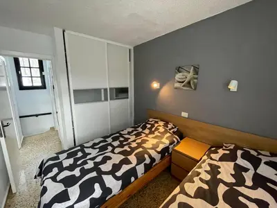 Cama o camas de una habitación en Las Fresas Apartments