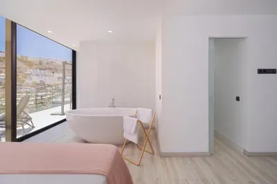 Cama o camas de una habitación en The One Luxury Apartments