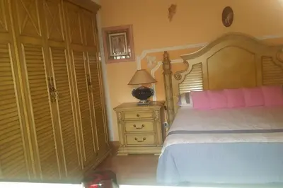 Cama o camas de una habitación en Casa Familiar CD