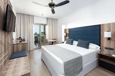 Cama o camas de una habitación en Hotel Riu Palace Oasis