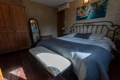 Cama o camas de una habitación en Roque nublo rural houses I