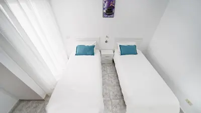 Cama o camas de una habitación en NARANJA