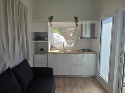 Una cocina o zona de cocina en Blue Ocean Camp - Tasartico