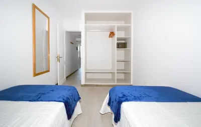 Cama o camas de una habitación en Apartamentos Monte Verde