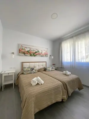 Cama o camas de una habitación en Billy's Marina 360 with pool access