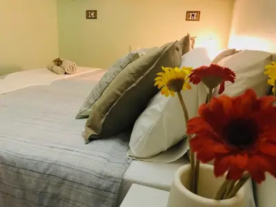 Cama o camas de una habitación en HOME LOS ELEFANTES