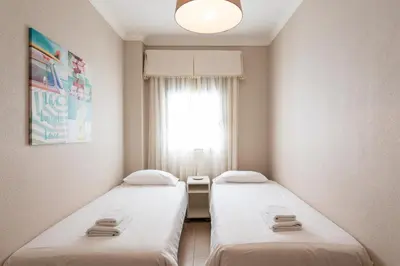 Cama o camas de una habitación en Front line with nice terrace By CanariasGetaway