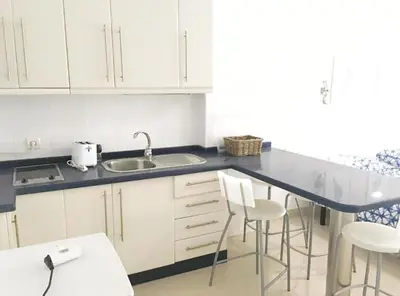 Una cocina o zona de cocina en Padre Cueto Beach Flat by Canary365