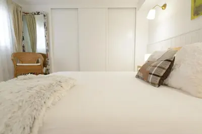 Cama o camas de una habitación en ACOGEDORA CASITA CERCA DEL MAR