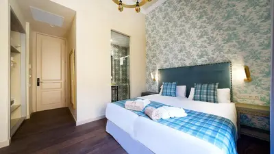 Cama o camas de una habitación en Hotel Emblemático Agáldar