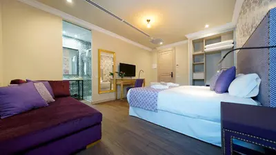 Una televisión o centro de entretenimiento en Hotel Emblemático Agáldar