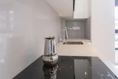 Una cocina o zona de cocina en Apartamento Las Canteras Beachway