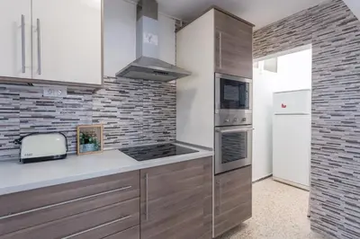 Una cocina o zona de cocina en Cozy Apartment in Salinetas Beach.