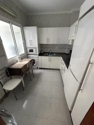 Una cocina o zona de cocina en Apartamento céntrico y luminoso ALCARAVANERAS