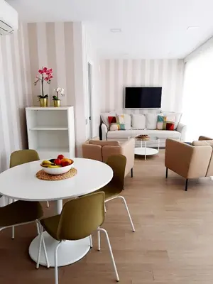 Una televisión o centro de entretenimiento en Malibú Canteras Ático 23 Vista Mar - Seaview Penthouse