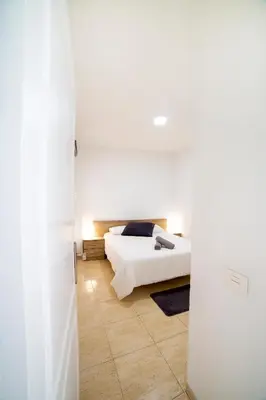Cama o camas de una habitación en Avenida 40