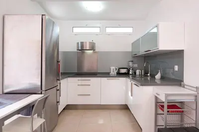 Una cocina o zona de cocina en Sonora Aircon Bungalow 90