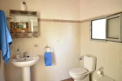 Un baño de B&B and Apartments El Charco Azul